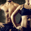 Torsos of fit couple with hands on hips.